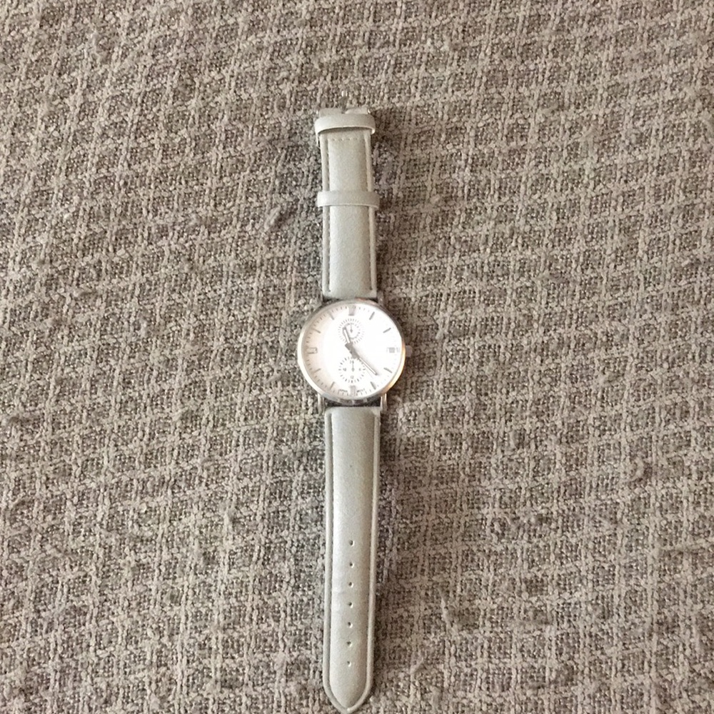 WATCH-- gray and silver watch, stone details